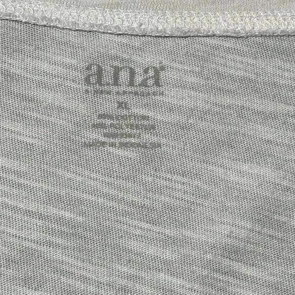 A New Approach size XL white tee with gold print on front and rolled sleeves EUC - Picture 8 of 10